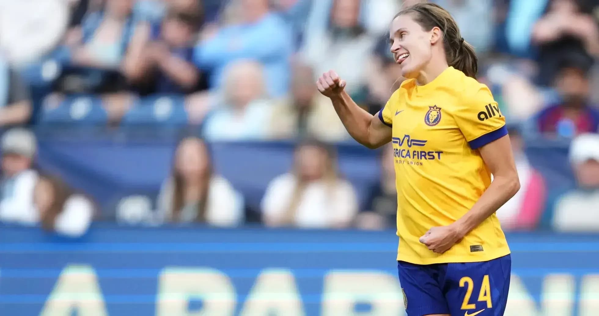 Player celebrating during NWSL match Player celebrating during NWSL match