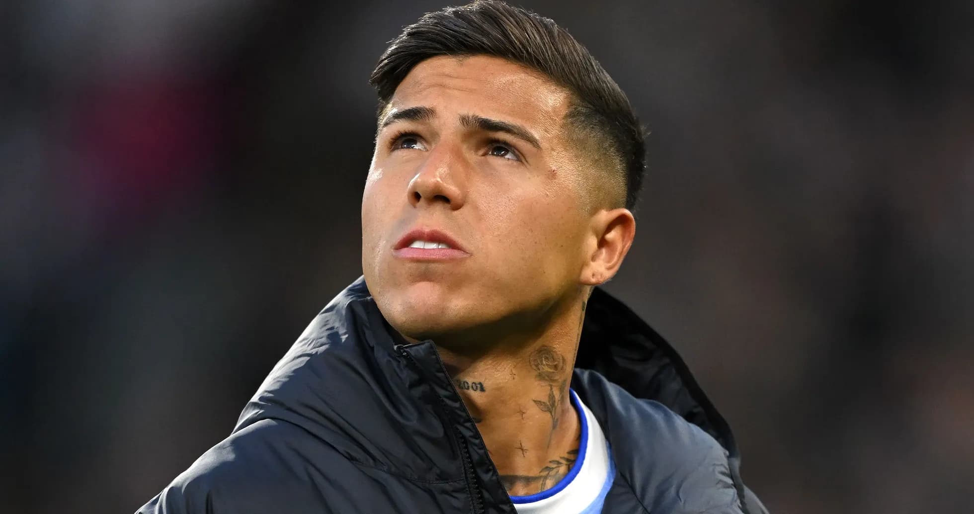Player looking up while wearing a jacket Player looking up while wearing a jacket