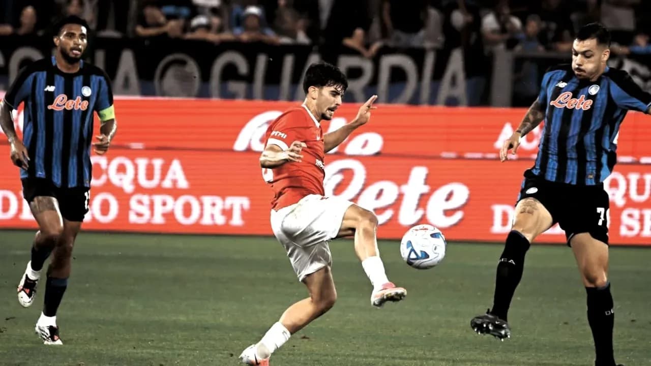 Player attempting to control the ball during match Player attempting to control the ball during match