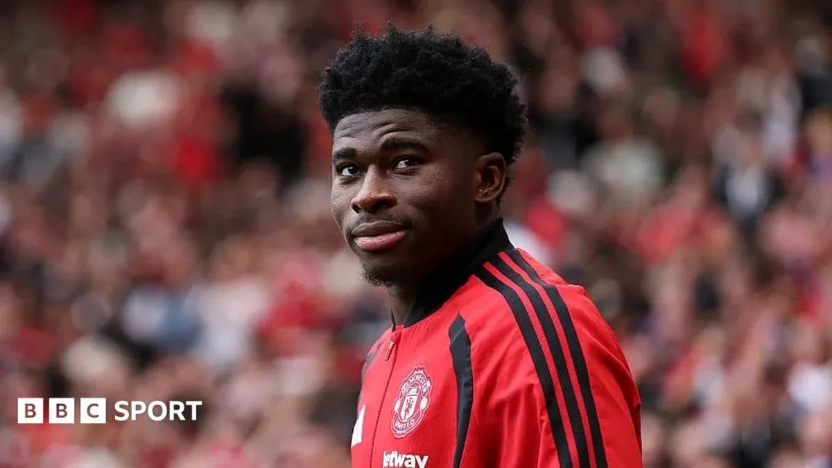 Player in Manchester United kit during match Player in Manchester United kit during match