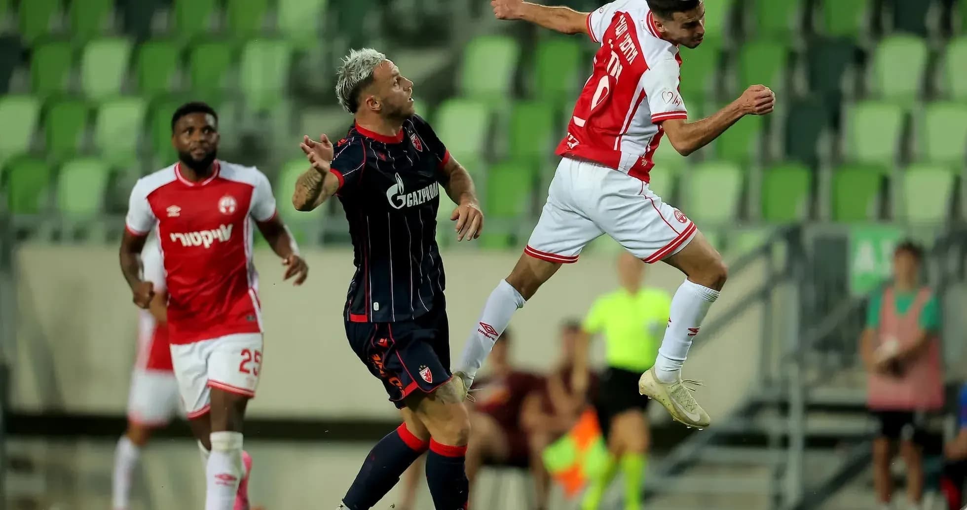 Crvena Zvezda player jumping for the ball Crvena Zvezda player jumping for the ball