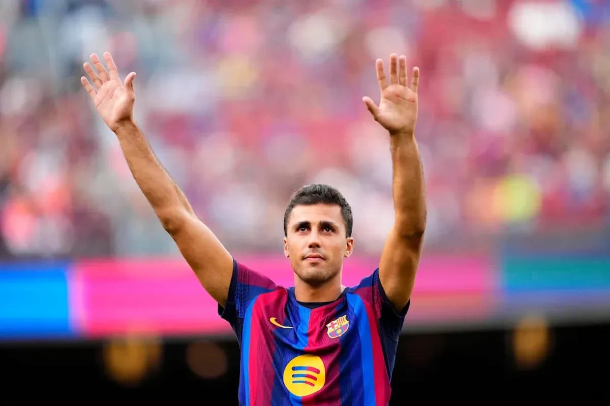 Player celebrating with raised hands at Camp Nou Player celebrating with raised hands at Camp Nou