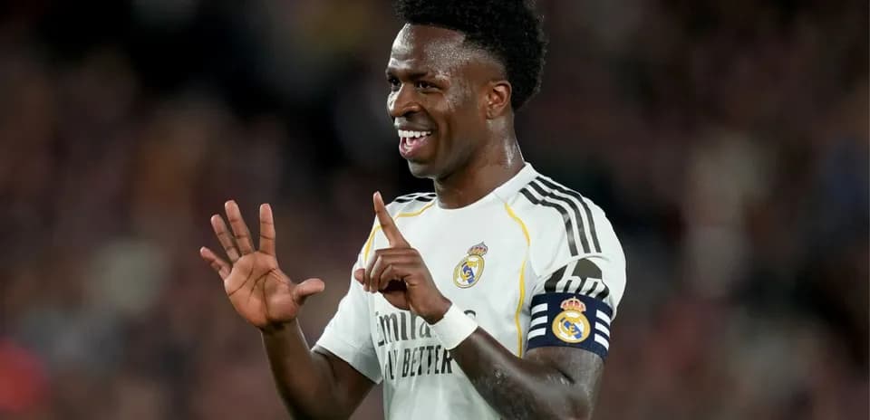 Player celebrating on field wearing Real Madrid kit Player celebrating on field wearing Real Madrid kit