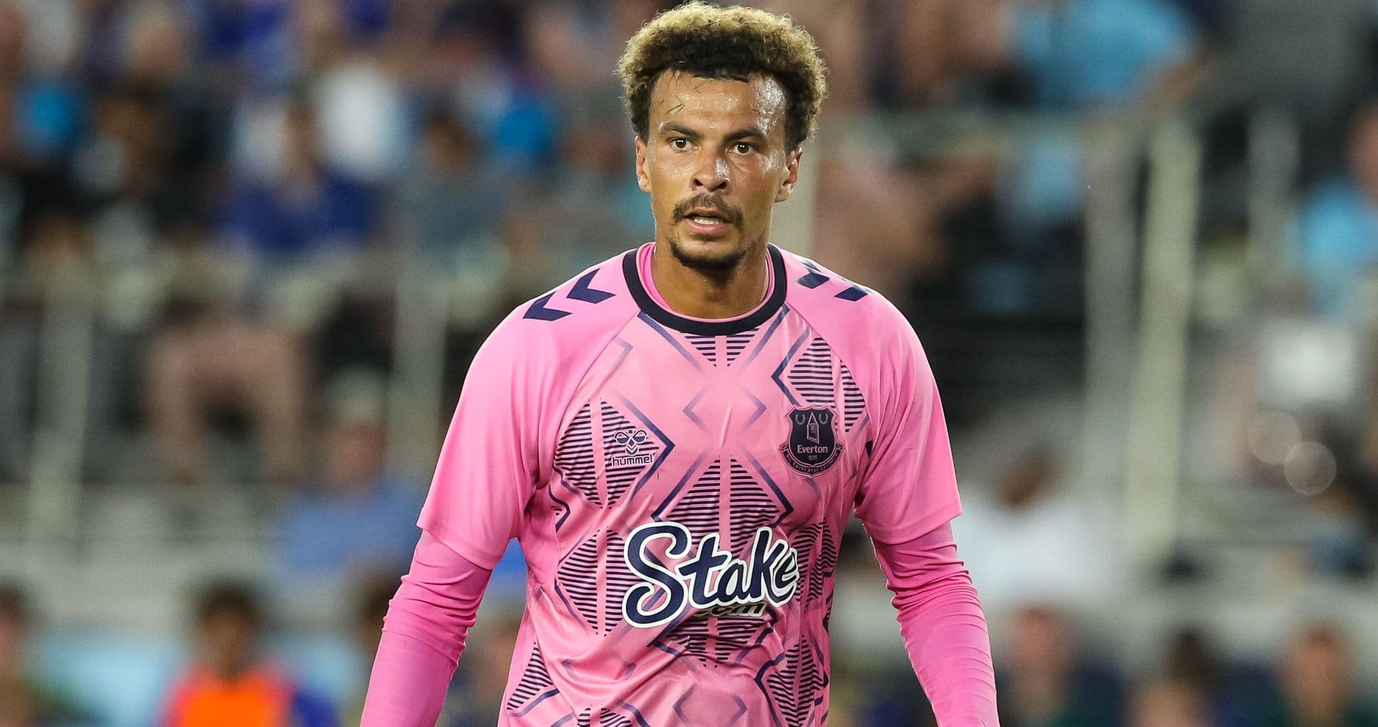 Goalkeeper wearing pink jersey during match Goalkeeper wearing pink jersey during match