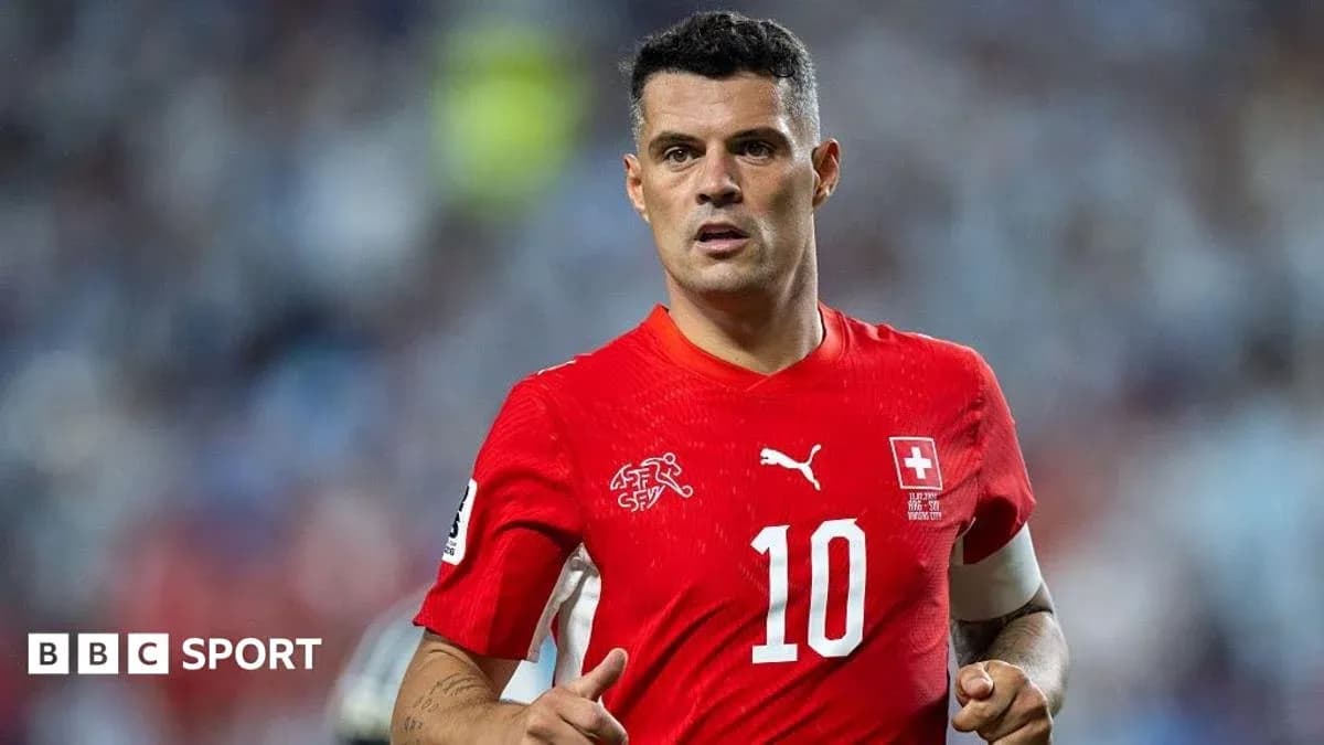 Player in red jersey during match action Player in red jersey during match action