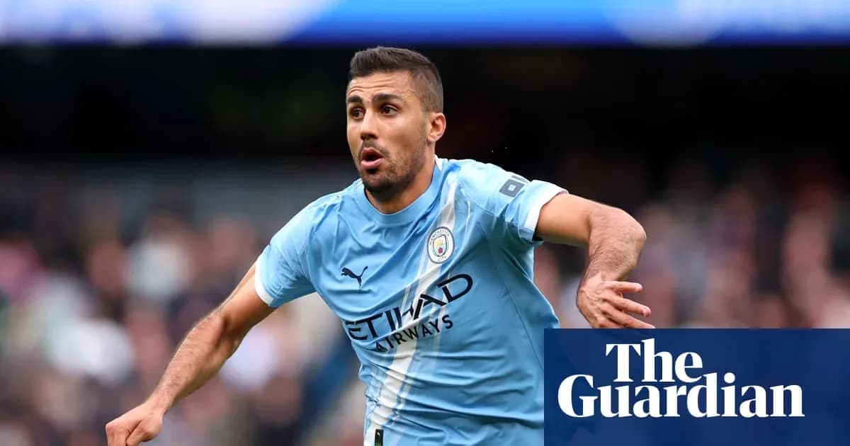Player running with ball during Manchester City match Player running with ball during Manchester City match