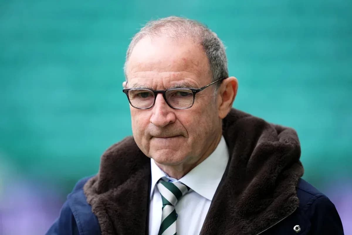 Manager walking on the pitch before a match Manager walking on the pitch before a match
