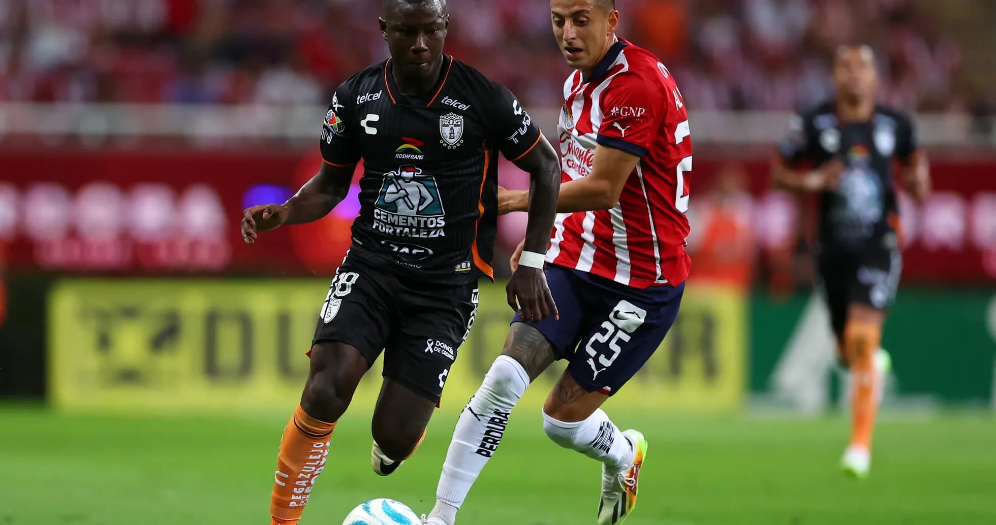Players from CF Pachuca and Guadalajara Chivas competing Players from CF Pachuca and Guadalajara Chivas competing