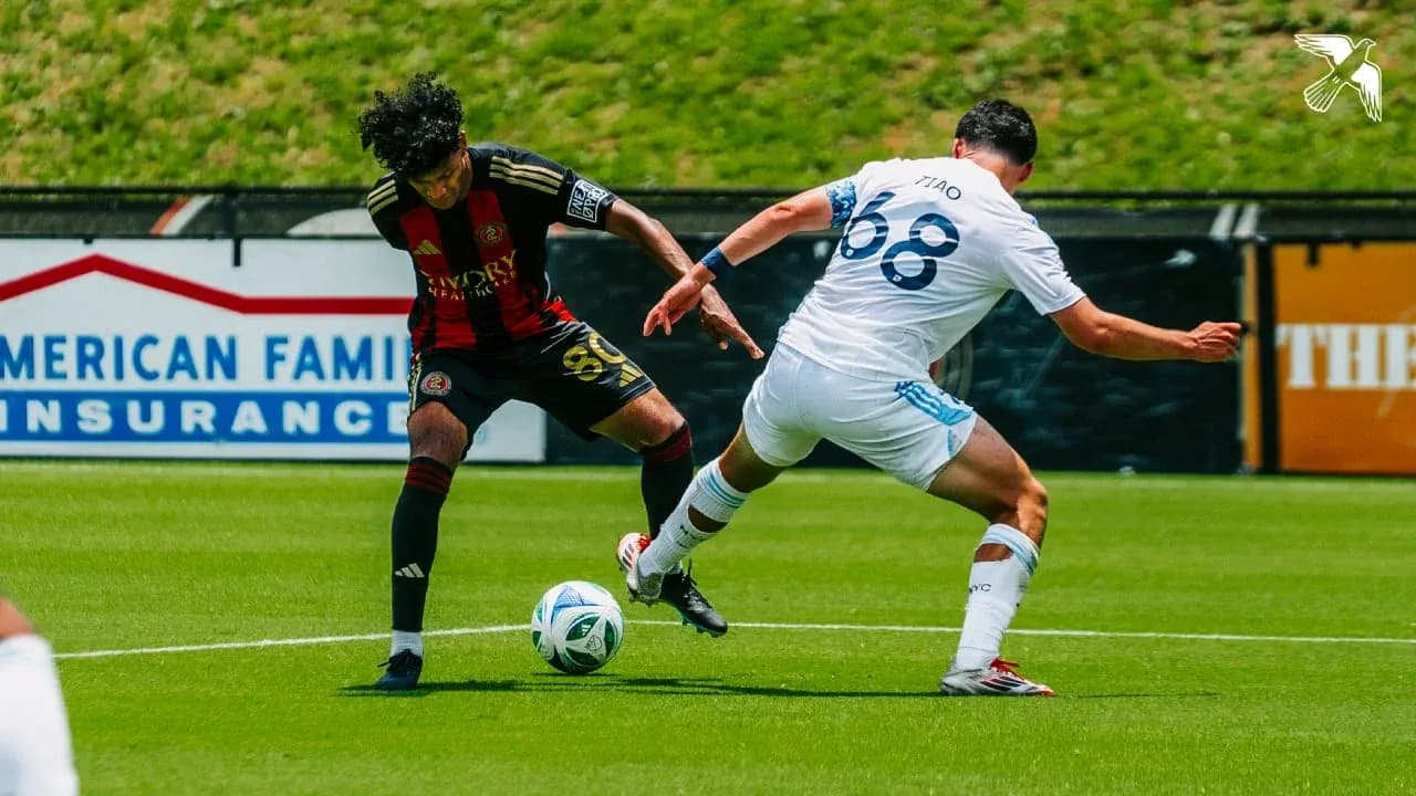 Atlanta United II player tackling New York City II player Atlanta United II player tackling New York City II player