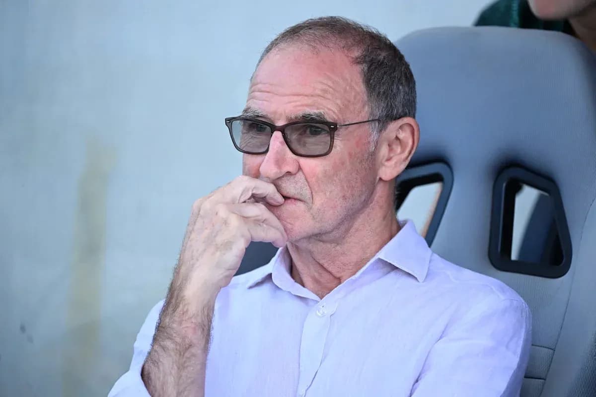 Man in glasses sitting on sports bench Man in glasses sitting on sports bench