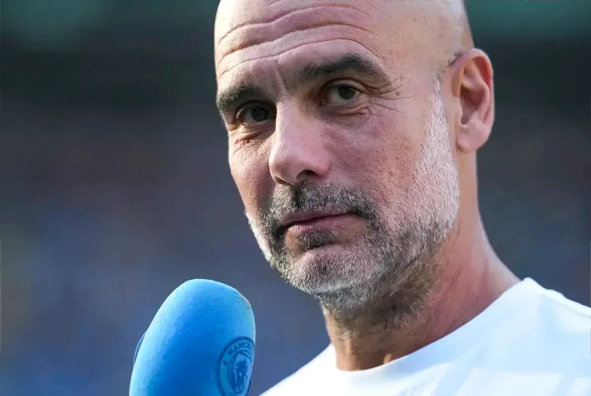 Manager speaking into microphone at event Manager speaking into microphone at event