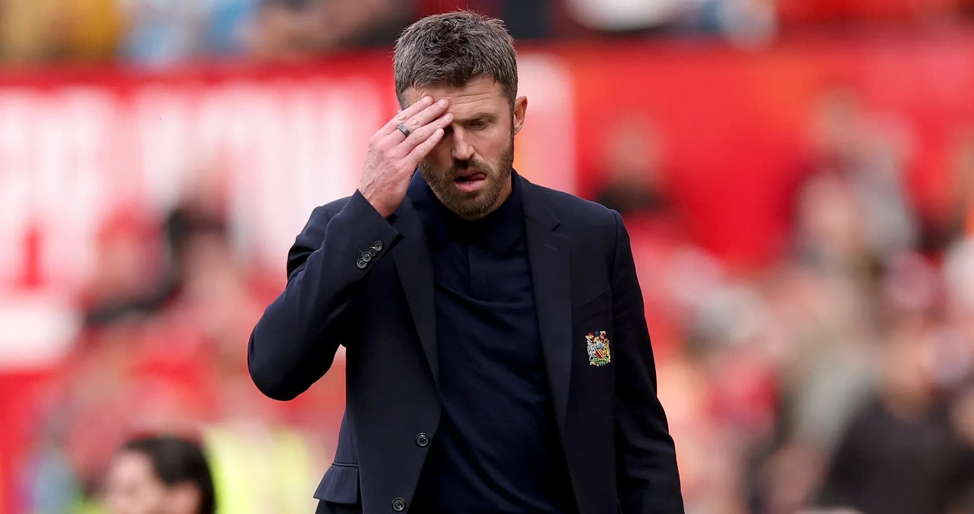 Manager walking on the pitch during a match Manager walking on the pitch during a match