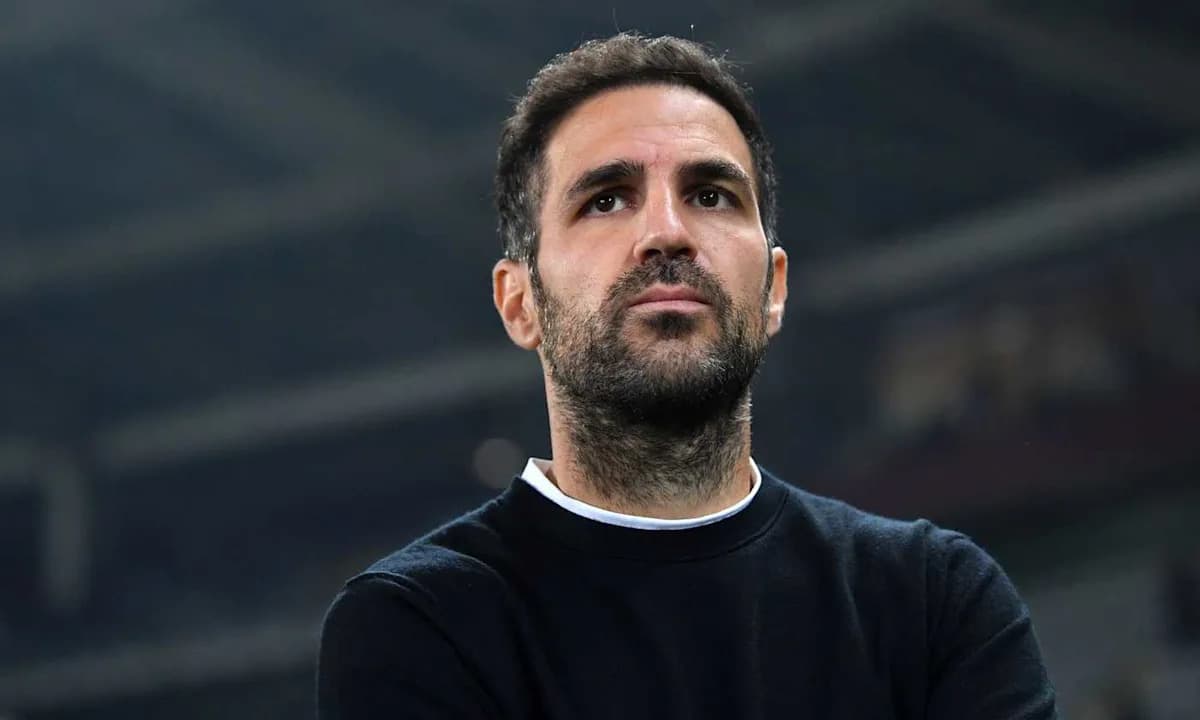 Man looking contemplative in a stadium setting Man looking contemplative in a stadium setting