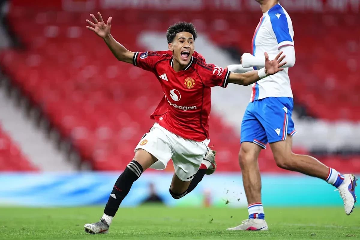 Player celebrating after scoring a goal for Manchester United Player celebrating after scoring a goal for Manchester United