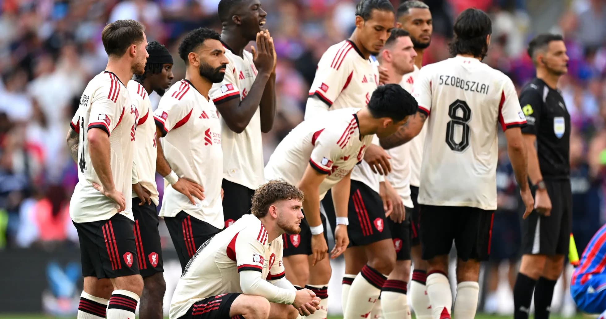 Team in white jerseys preparing for a free kick Team in white jerseys preparing for a free kick