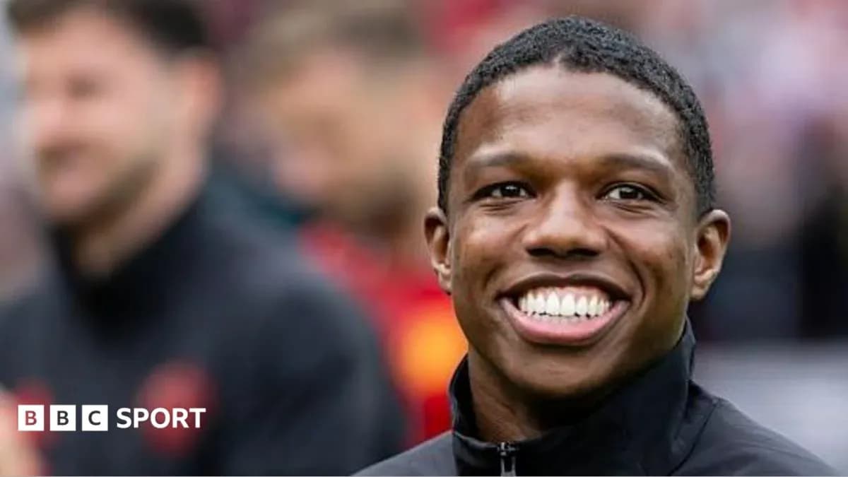 Player smiling during pre-match warm-up Player smiling during pre-match warm-up