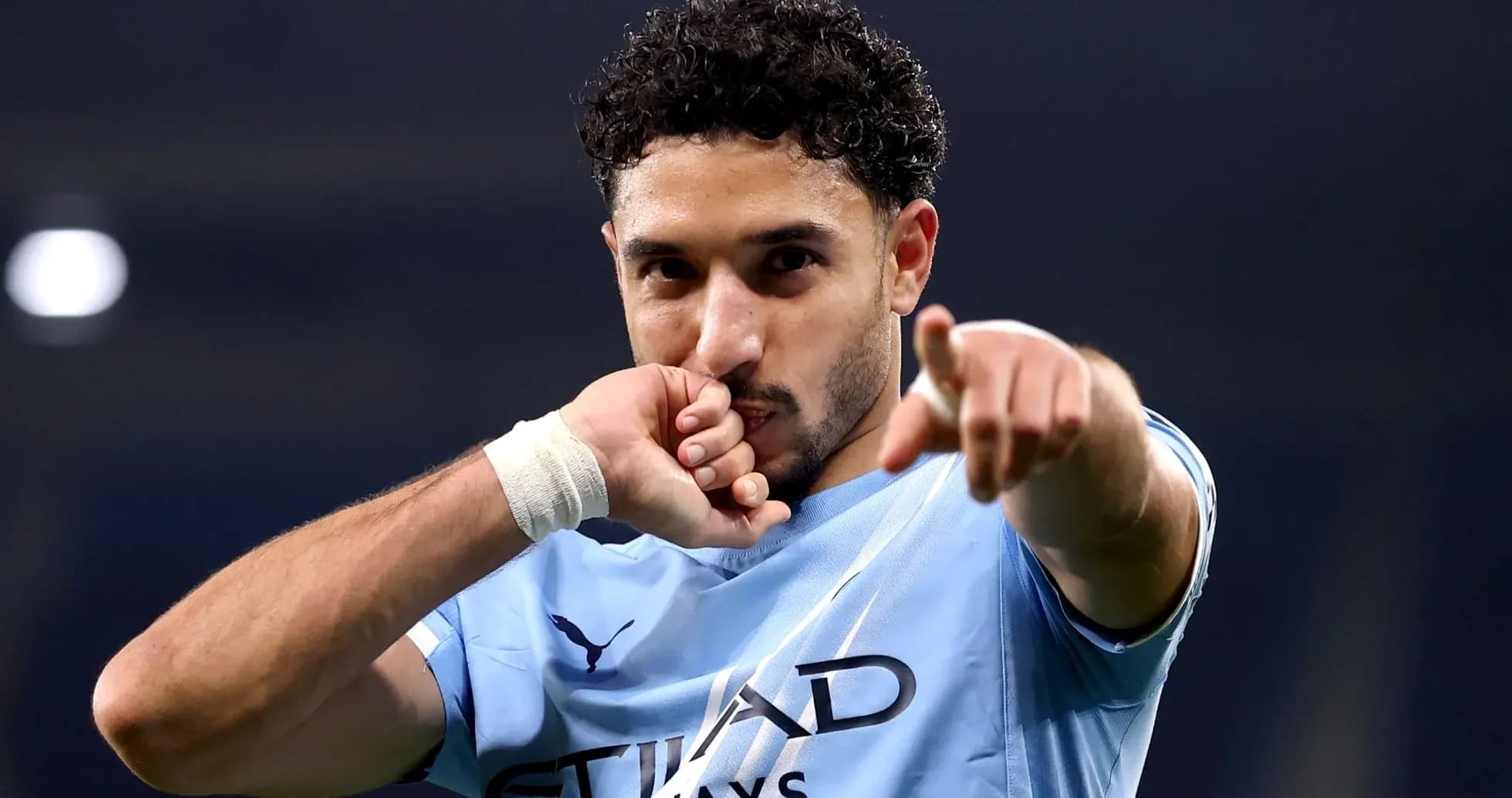 Player celebrating and pointing after scoring goal Player celebrating and pointing after scoring goal