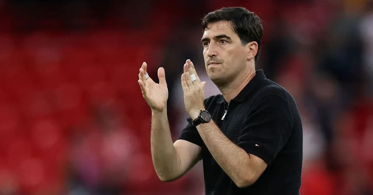 Coach gesturing and clapping during match Coach gesturing and clapping during match