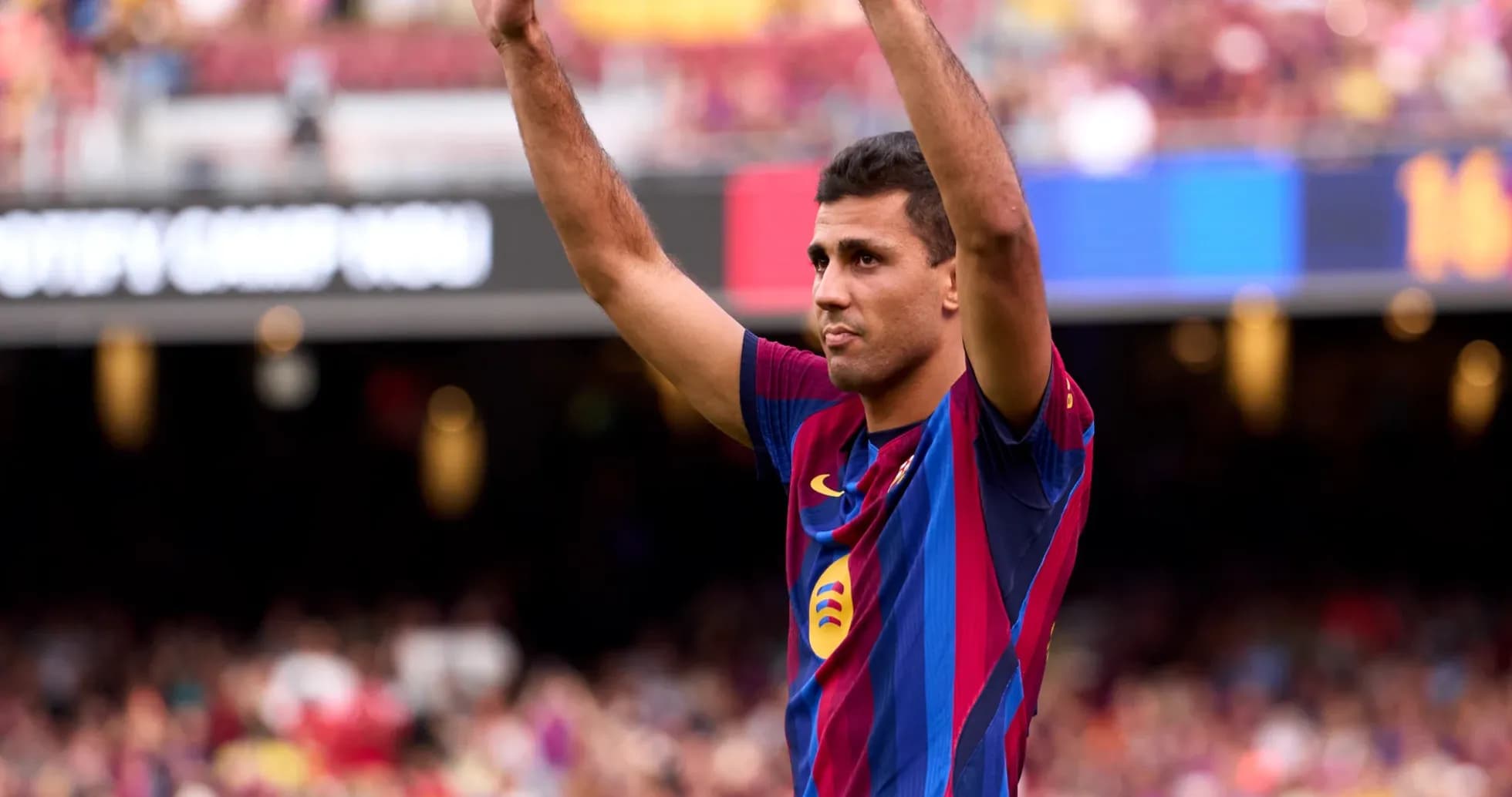 Player celebrating in FC Barcelona jersey at Camp Nou Player celebrating in FC Barcelona jersey at Camp Nou