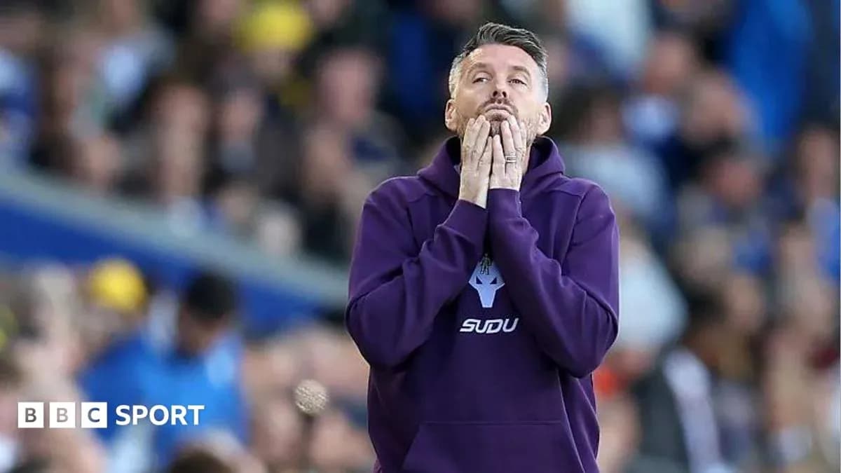 Coach expressing concern during a match Coach expressing concern during a match