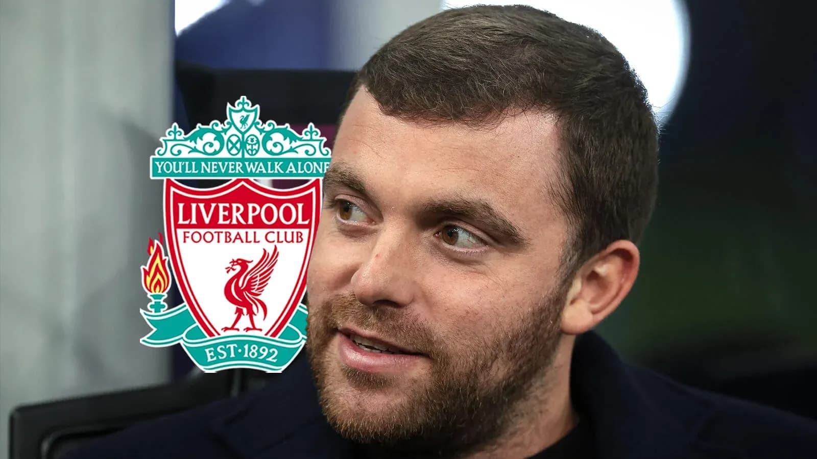 Man with beard next to Liverpool FC logo Man with beard next to Liverpool FC logo