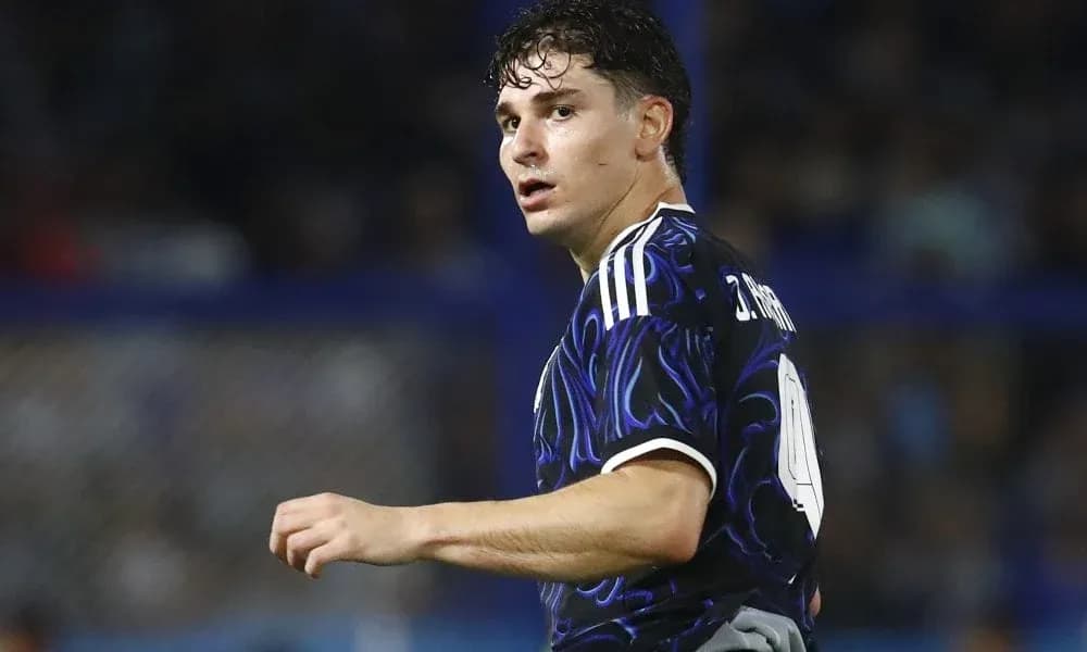 Player in black jersey turning during match action Player in black jersey turning during match action