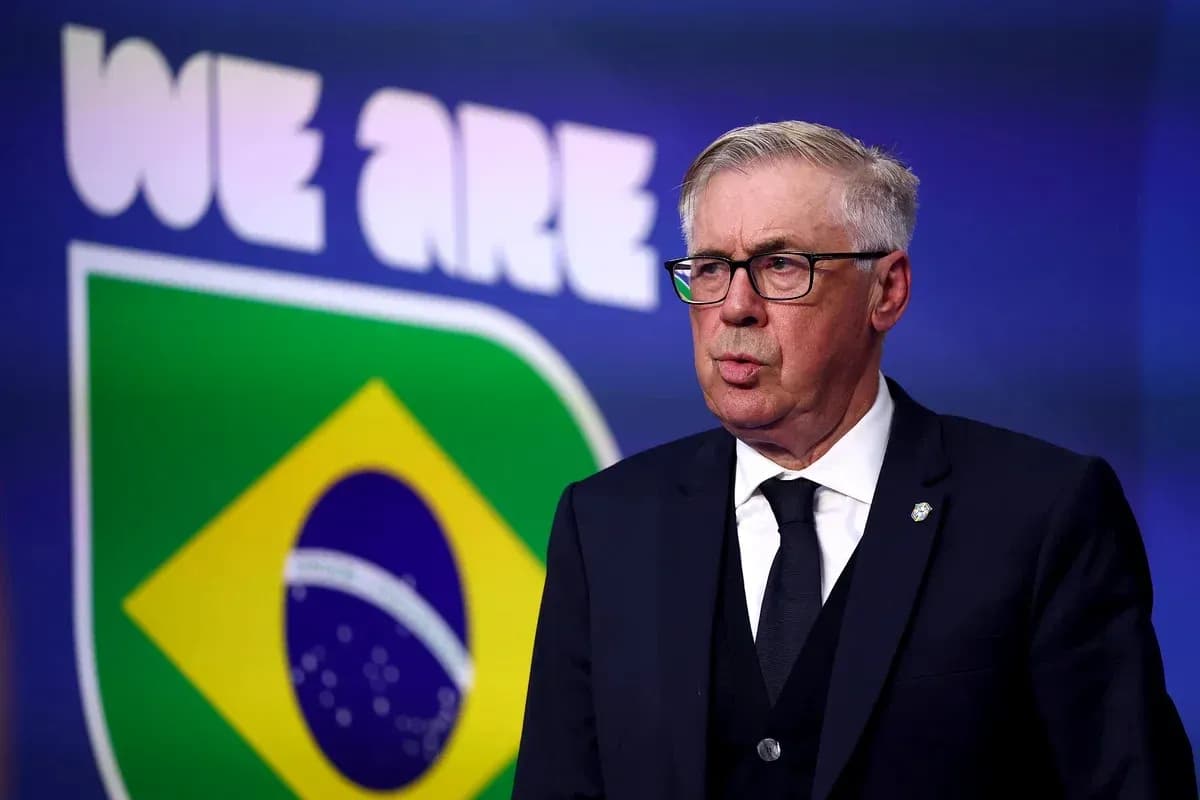 Coach speaking at press conference with Brazil logo behind Coach speaking at press conference with Brazil logo behind