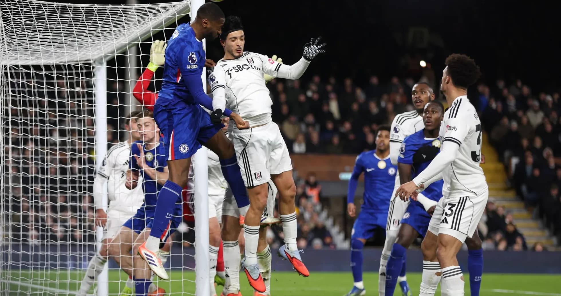 Chelsea player attempting a header during match Chelsea player attempting a header during match