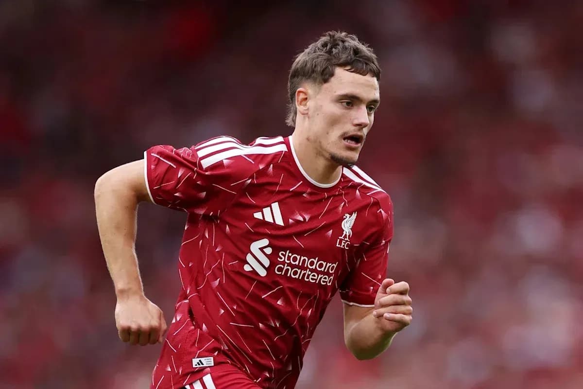 Player running during a Liverpool match Player running during a Liverpool match
