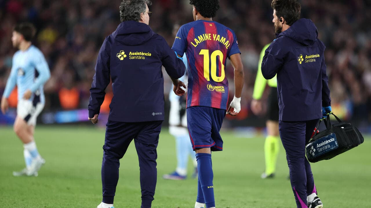 Player Lamine Yamal receiving medical attention on field Player Lamine Yamal receiving medical attention on field