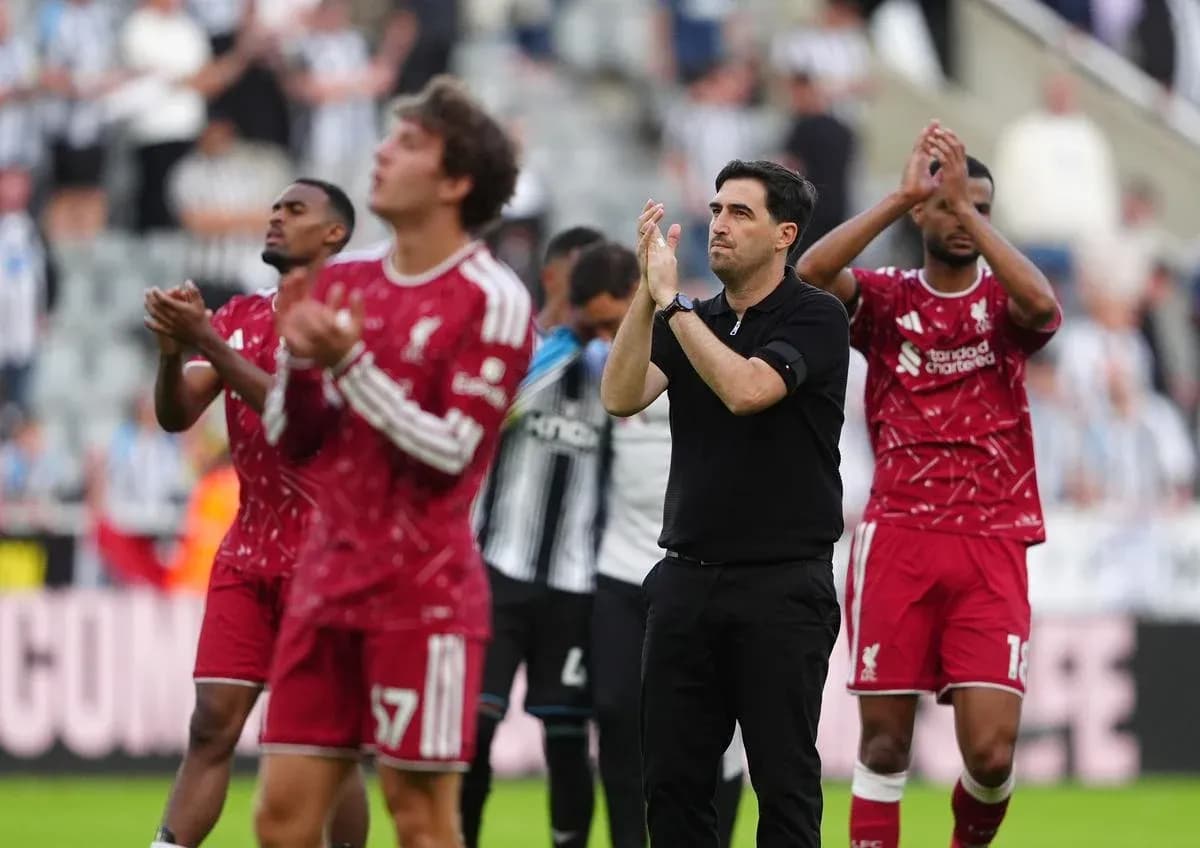 Liverpool players and manager applauding fans post-match Liverpool players and manager applauding fans post-match