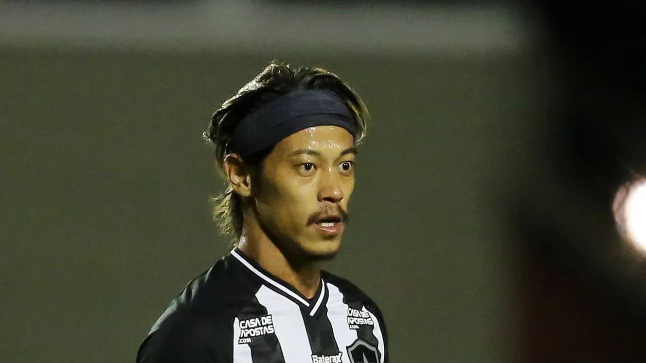 Player wearing black and white jersey during match Player wearing black and white jersey during match