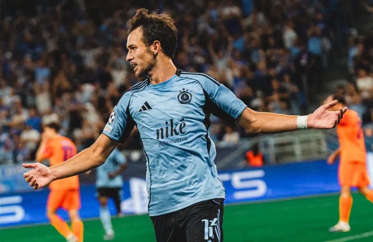 Player celebrating during Champions League match Player celebrating during Champions League match