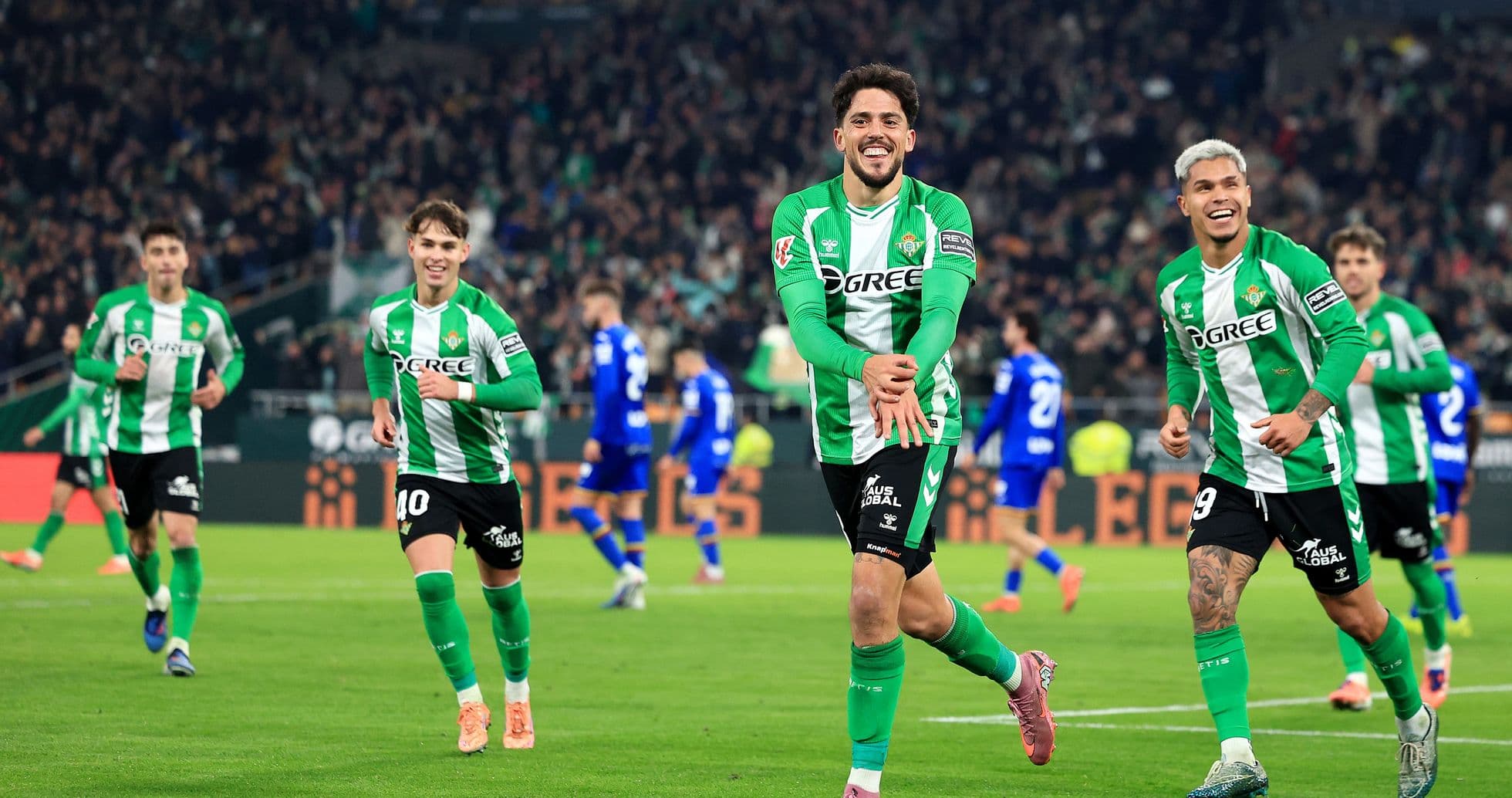 Real Betis players celebrating a goal Real Betis players celebrating a goal