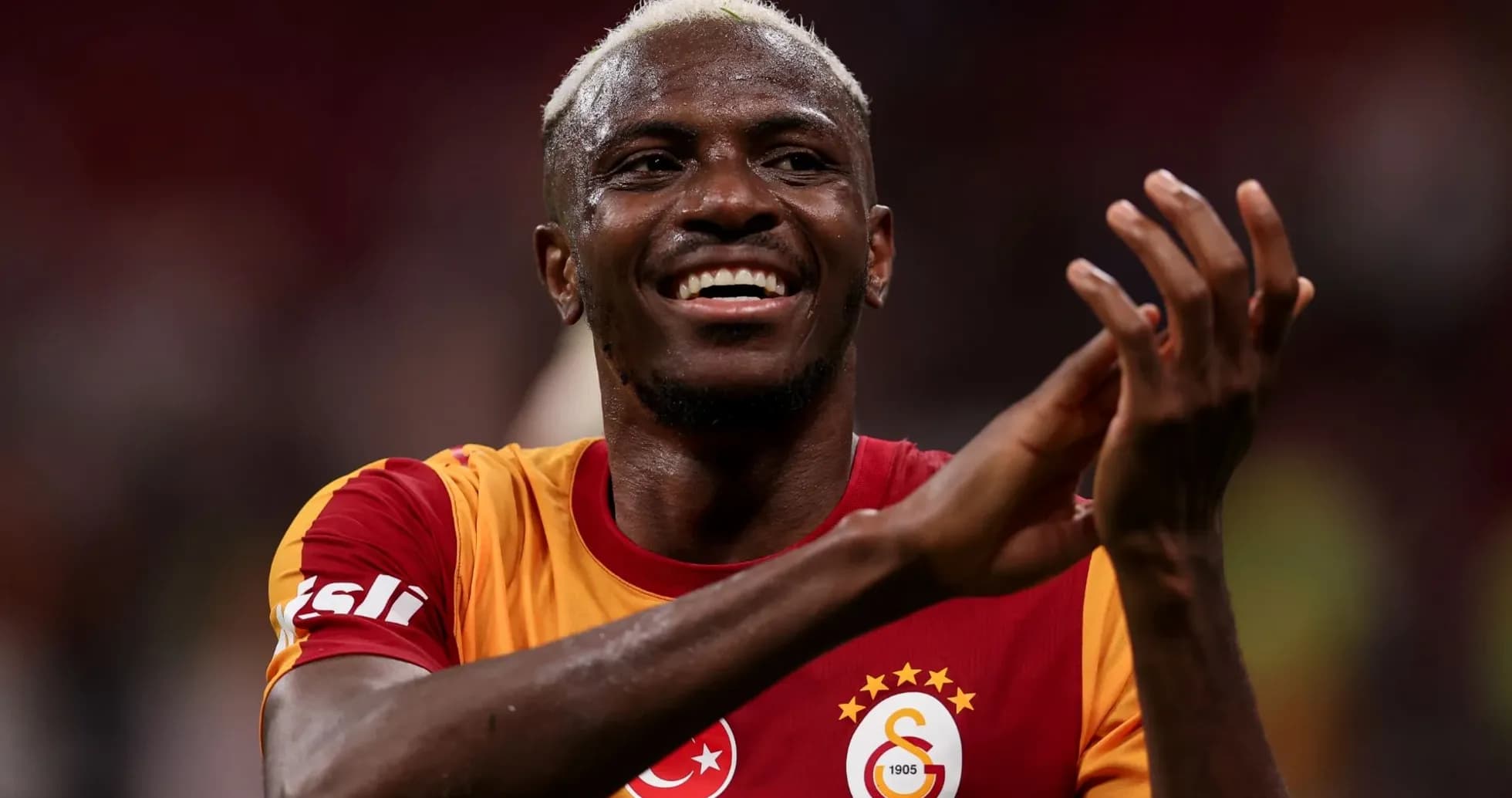 Player celebrating in Galatasaray jersey after match Player celebrating in Galatasaray jersey after match