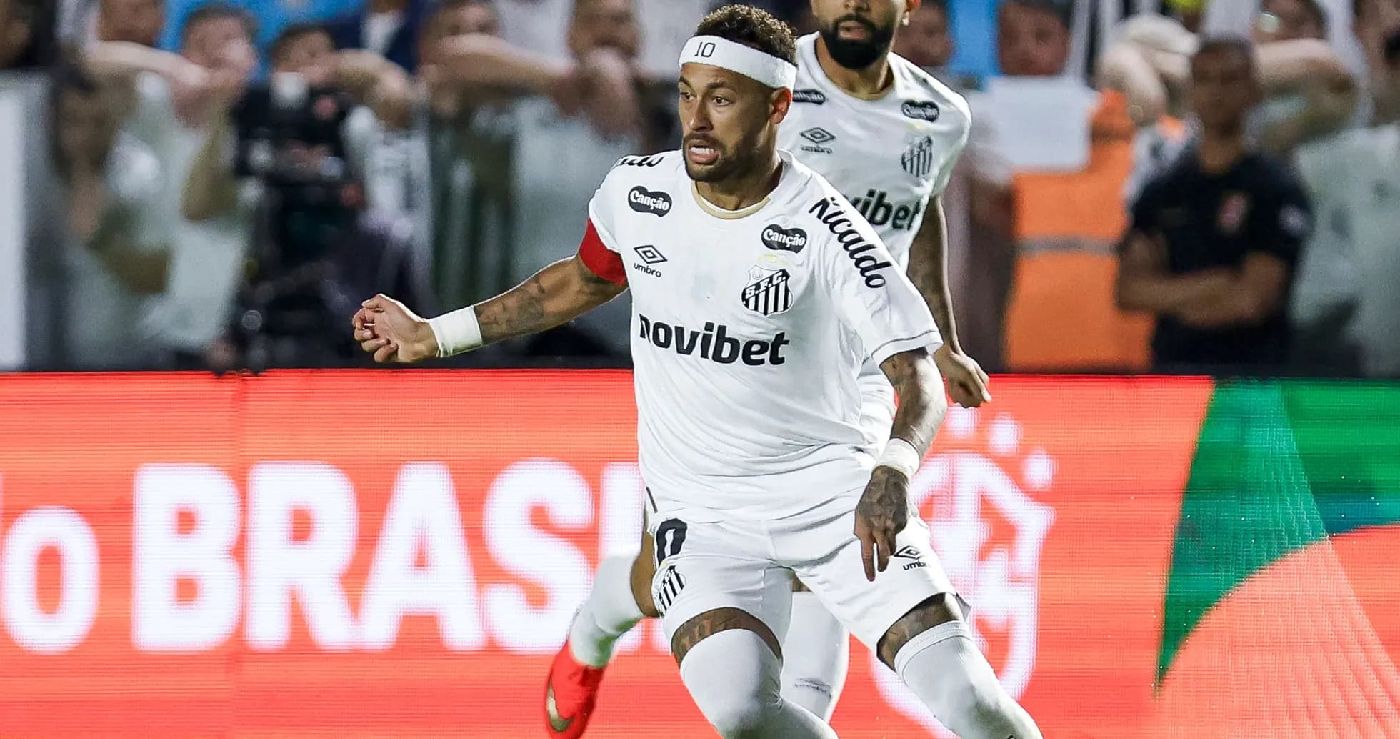 Neymar celebrating during a Santos FC match Neymar celebrating during a Santos FC match