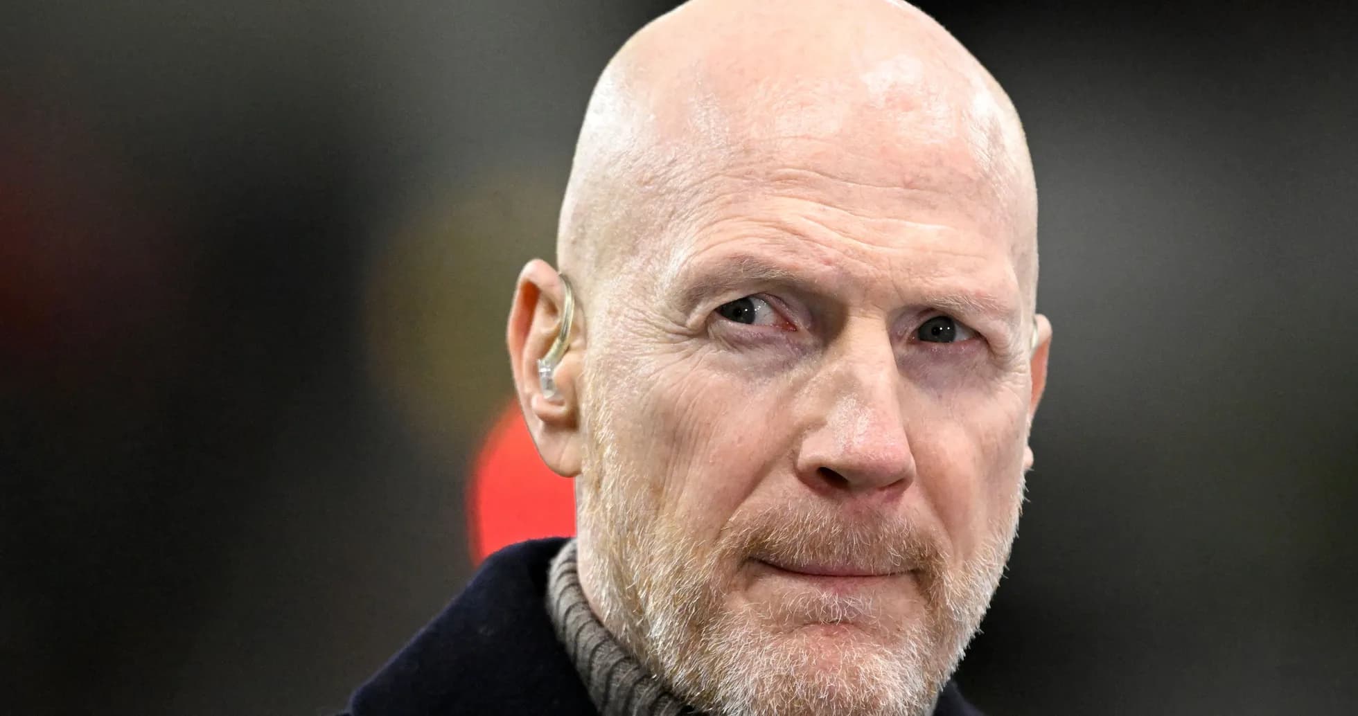 Man with bald head and beard wearing ear piece Man with bald head and beard wearing ear piece