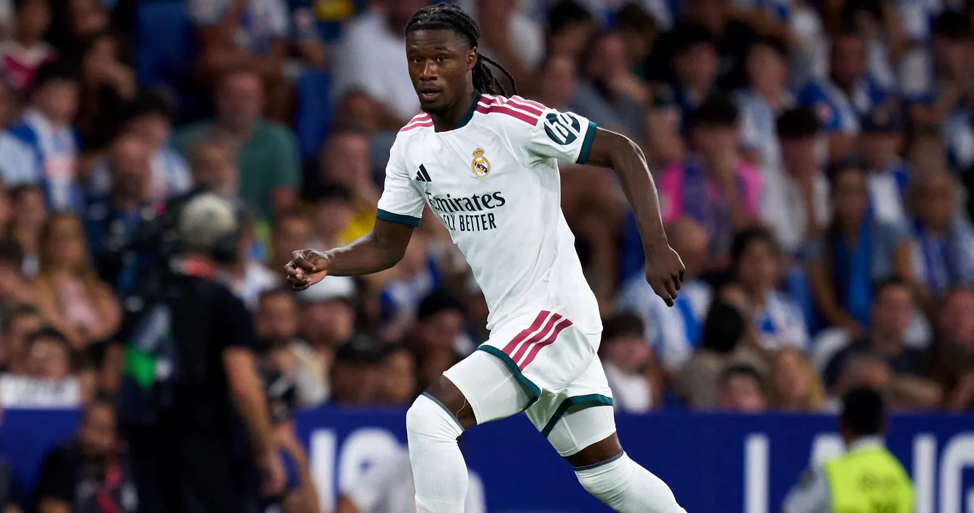 Player running on the field during a match Player running on the field during a match