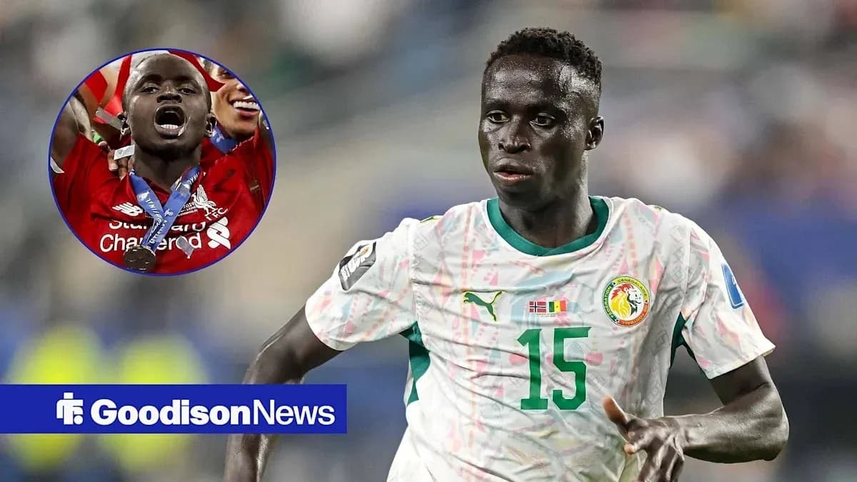 Player running in Senegal national team jersey during match Player running in Senegal national team jersey during match
