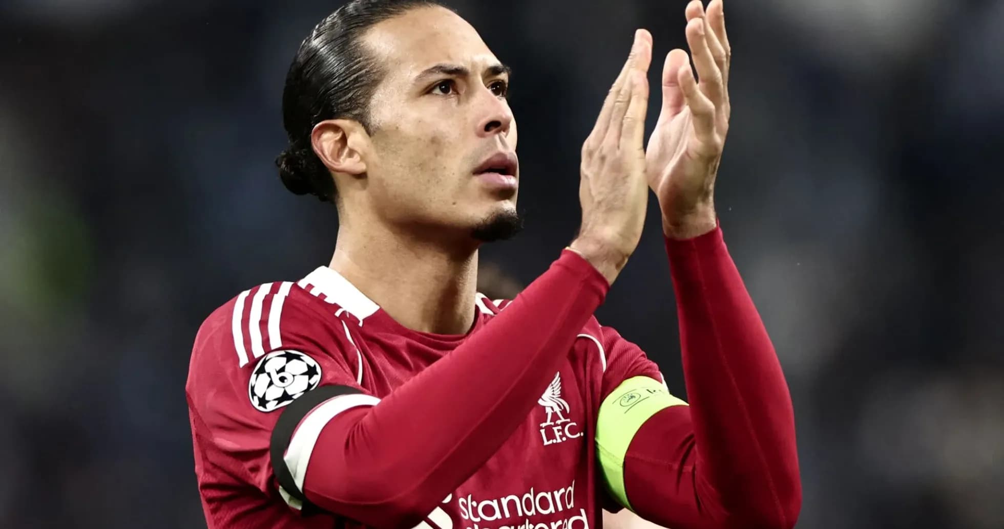 Player applauding fans during a match Player applauding fans during a match