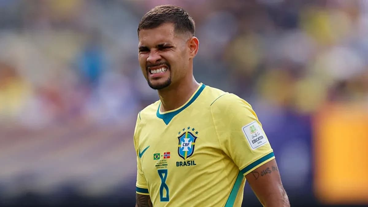 Brazilian player grimacing on the field during match Brazilian player grimacing on the field during match