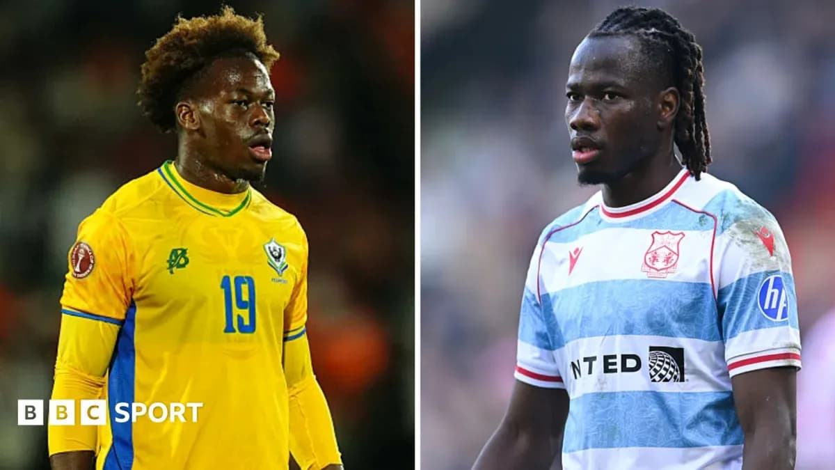 Two soccer players wearing national and club jerseys Two soccer players wearing national and club jerseys