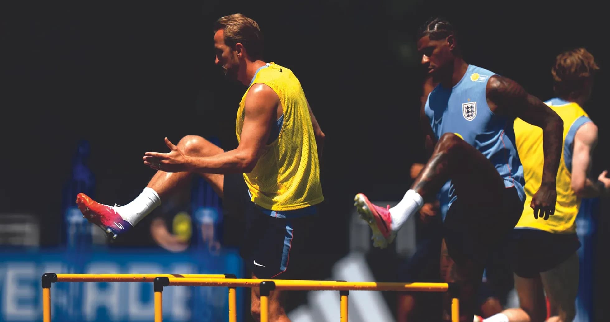 Players practicing hurdle drills during training session Players practicing hurdle drills during training session