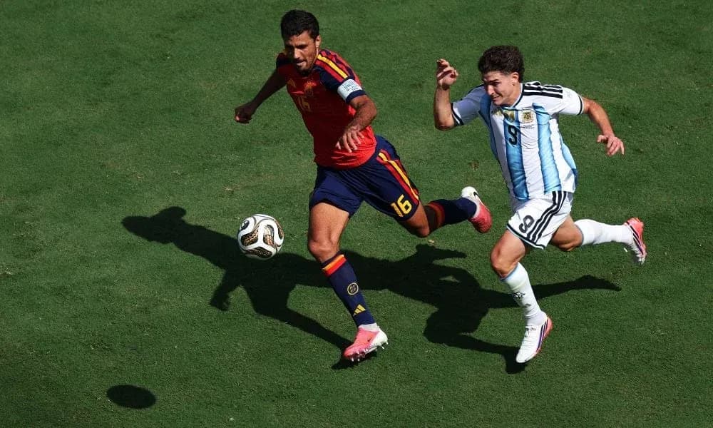 Two players competing for the ball during match Two players competing for the ball during match