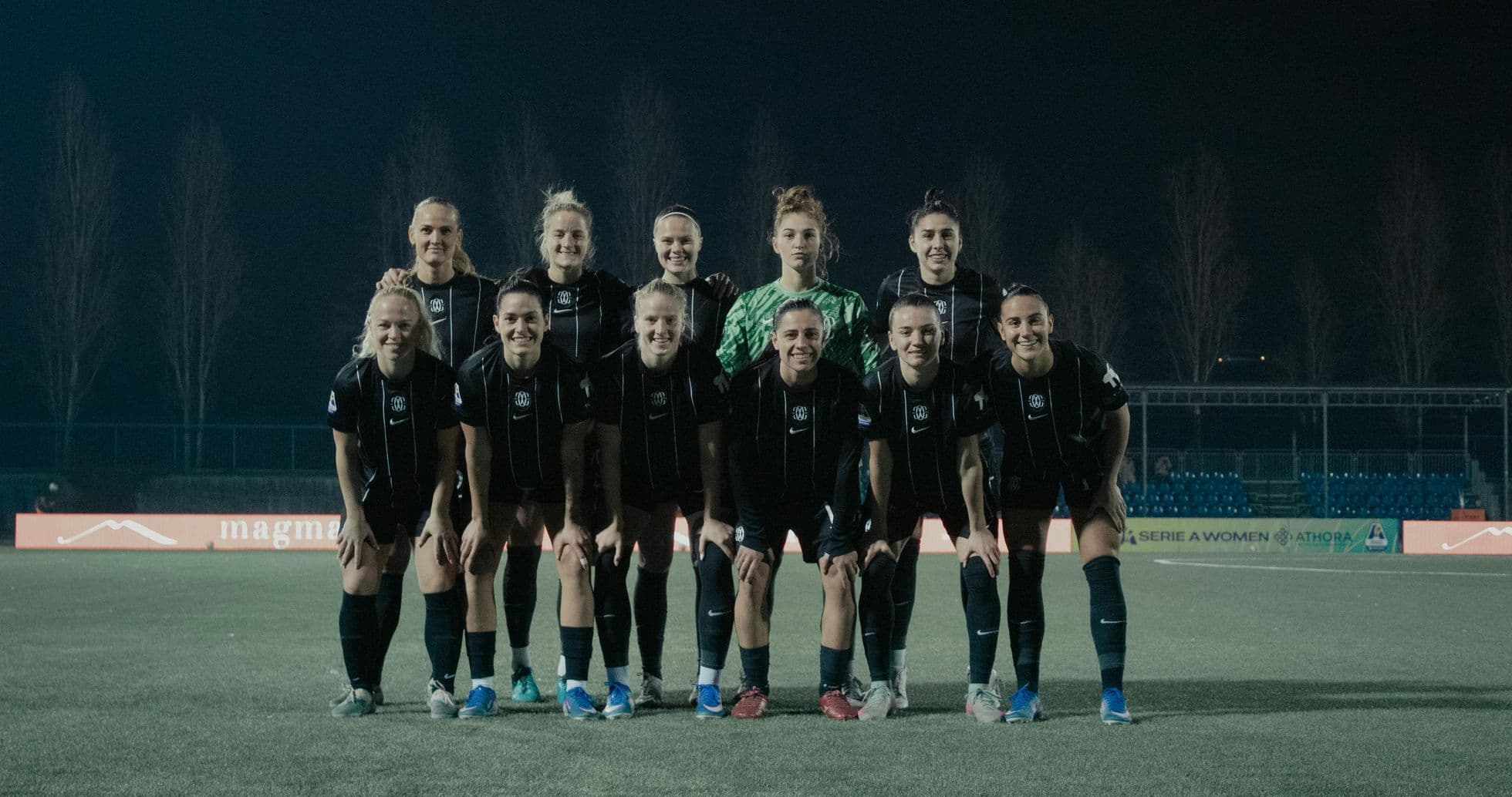 Como W team posing for a group photo Como W team posing for a group photo