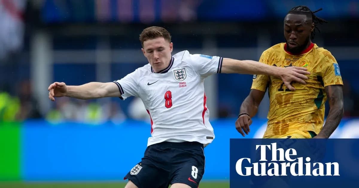 Player tackling opponent during international football match Player tackling opponent during international football match