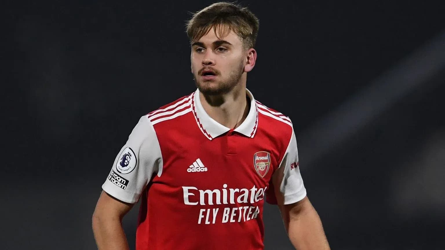 Player wearing Arsenal jersey during match action Player wearing Arsenal jersey during match action
