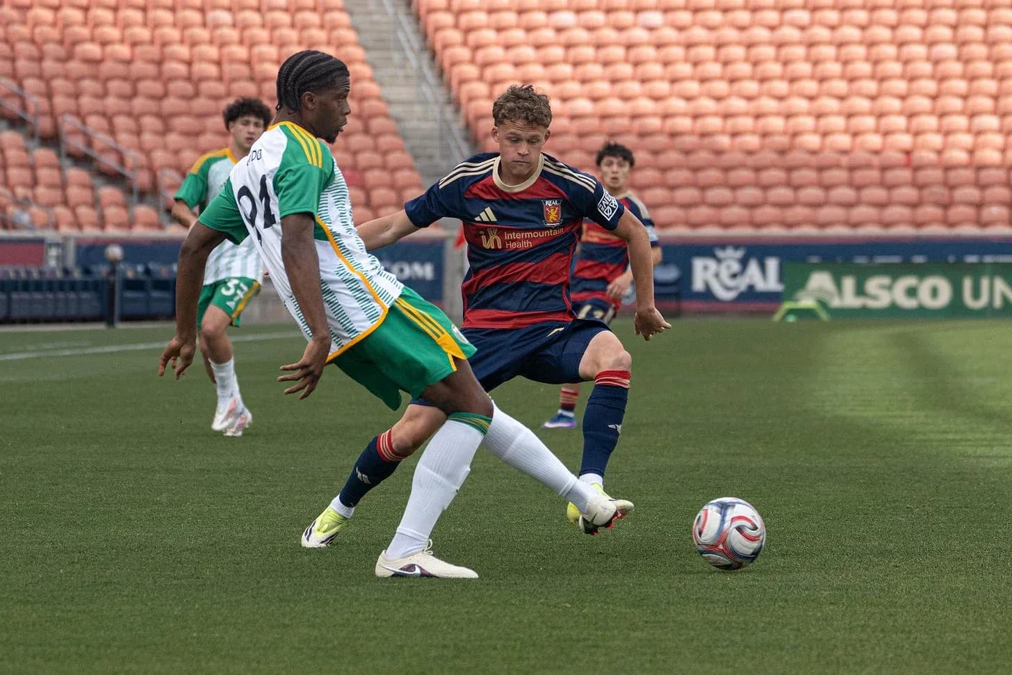 Player tackling during Portland Timbers II match Player tackling during Portland Timbers II match