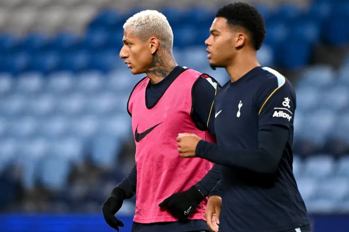 Two Tottenham players warming up before a match Two Tottenham players warming up before a match