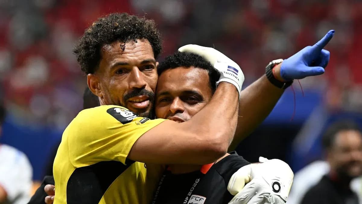 Goalkeeper and coach celebrating after match Goalkeeper and coach celebrating after match